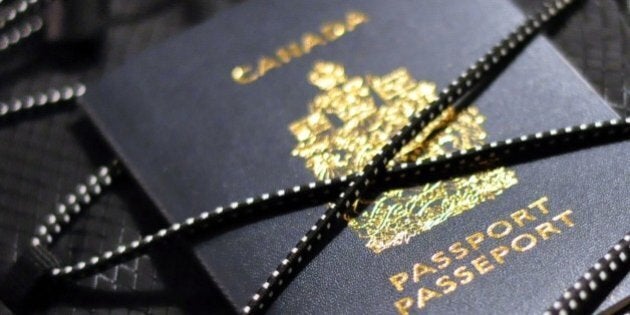 Canadian passport tucked insidebungee cord of backpack