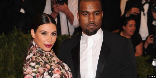 NEW YORK, NY - MAY 06: Kim Kardashian and Kanye West attend the Costume Institute Gala for the 'PUNK: Chaos to Couture' exhibition at the Metropolitan Museum of Art on May 6, 2013 in New York City. (Photo by Jamie McCarthy/Getty Images for The Huffington Post)