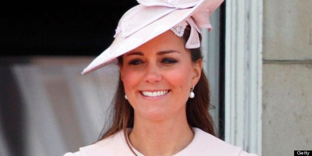 LONDON, UNITED KINGDOM - JUNE 15: (EMBARGOED FOR PUBLICATION IN UK NEWSPAPERS UNTIL 48 HOURS AFTER CREATE DATE AND TIME) Catherine, Duchess of Cambridge stands on the balcony of Buckingham Palace during the annual Trooping the Colour Ceremony on June 15, 2013 in London, England. Today's ceremony which marks the Queen's official birthday will not be attended by Prince Philip the Duke of Edinburgh as he recuperates from abdominal surgery. This will also be The Duchess of Cambridge's last public engagement before her baby is due to be born next month. (Photo by Max Mumby/Indigo/Getty Images)
