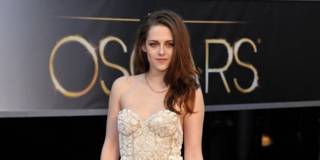 Actress Kristen Stewart arrives at the Oscars at the Dolby Theatre on Sunday Feb. 24, 2013, in Los Angeles. (Photo by John Shearer/Invision/AP)