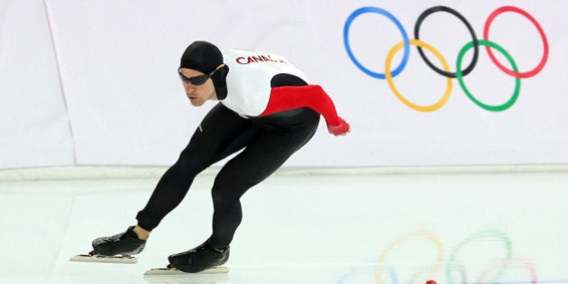 SOCHI, RUSSIA - FEBRUARY 15: Denny Morrison of Canada competes in the Men's 1500m Speed Skating event on day 8 of the Sochi 2014 Winter Olympics at Adler Arena Skating Center on February 15, 2014 in Sochi, Russia. (Photo by Quinn Rooney/Getty Images)