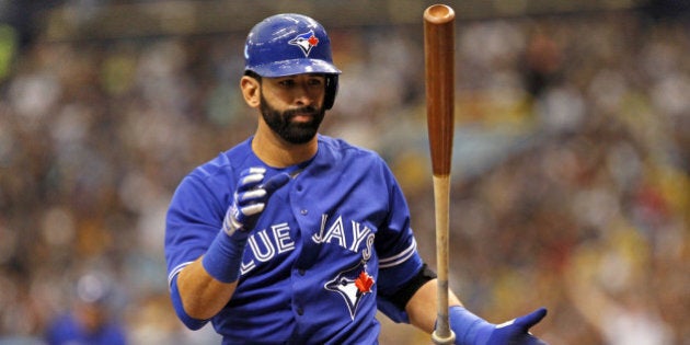 ST. PETERSBURG, FL - MARCH 31: Jose Bautista #19 of the Toronto Blue Jays reacts after striking out swinging to end the top of the first inning of a game against the Tampa Bay Rays on Opening Day on March 31, 2014 at Tropicana Field in St. Petersburg, Florida. (Photo by Brian Blanco/Getty Images)