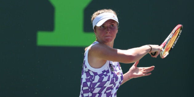 KEY BISCAYNE, FL - MARCH 21: Elina Svitolina of Ukraine in action against Eugenie Bouchard of Canada during their second round match during day 5 at the Sony Open at Crandon Park Tennis Center on March 21, 2014 in Key Biscayne, Florida. (Photo by Clive Brunskill/Getty Images)