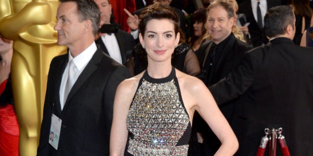 HOLLYWOOD, CA - MARCH 02: Actress Anne Hathaway attends the Oscars held at Hollywood & Highland Center on March 2, 2014 in Hollywood, California. (Photo by Michael Buckner/Getty Images)