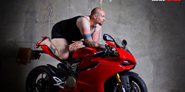 Man Biker With Tattoos Poses Together His Motorcycle In Workshop High-Res  Stock Photo - Getty Images