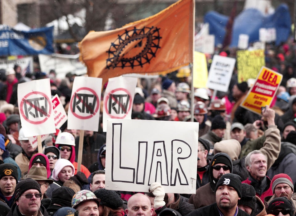 Protesters Hold Signs Outside Of Michigan Capitol