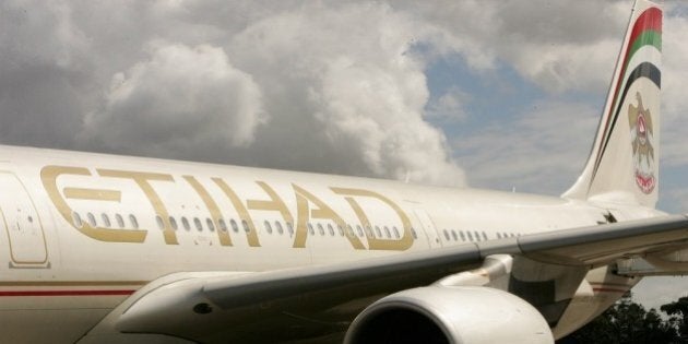 SYDNEY, AUSTRALIA - MARCH 27: The first flight from Etihad Airways, the national airline of the United Arab Emirates, arrives in Sydney and marks the opening of the airline's new non-stop route between Abu Dhabi and Sydney, at Sydney airport on March 27, 2007 in Australia. The airline launched its three flights a week A340-500 aircraft route, which will increase to a daily service from June 29. (Photo by Patrick Riviere/Getty Images)