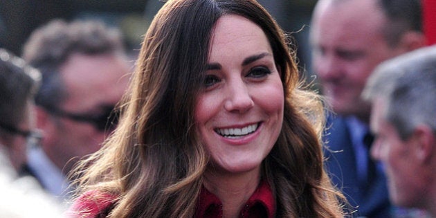 LONDON , ENGLAND - NOVEMBER 07: (EDITORS NOTE: Retransmission with alternate crop.) Catherine, Duchess of Cambridge prepares to meet staff and volunteers from The Royal British Legion's London Poppy Day Appeal at Kensington Palace on November 07, 2013 in London, England. (Photo by Carl Court - Pool/Getty Images)