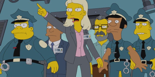 THE SIMPSONS: Lisa suspects Homer may have been "turned" when he returns from a Nuclear Power Plant Operating convention a changed man in the 'Homerland' 25th season premiere episode of THE SIMPSONS airing Sunday, Sept. 29, 2013 (8:00-8:30 PM ET/PT) on FOX. (Photo by FOX via Getty Images)