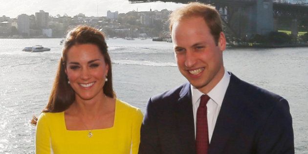 SYDNEY, AUSTRALIA - APRIL 16: Prince William, Duke of Cambridge and Catherine, Duchess of Cambridge pose in front of the Sydney Harbour Bridge at a reception at the Sydney Opera House on April 16, 2014 in Sydney, Australia. The Duke and Duchess of Cambridge are on a three-week tour of Australia and New Zealand, the first official trip overseas with their son, Prince George of Cambridge. (Photo by Jason Reed - Pool /Getty Images)