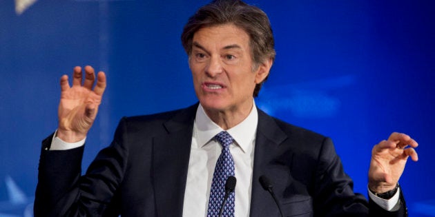 Talk show host Dr. Mehmet Oz, left, speaks at the closing session of the National Governors Association 2013 Winter Meeting in Washington, Monday, Feb. 25, 2013. (AP Photo/Manuel Balce Ceneta)