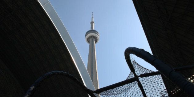 TORONTO, CANADA - MAY 20: A general view of the Rogers Centre roof opening with the CN Tower overhead on the morning before interleague MLB game action between the New York Mets and the Toronto Blue Jays on May 20, 2012 at Rogers Centre in Toronto, Ontario, Canada. (Photo by Tom Szczerbowski/Getty Images)