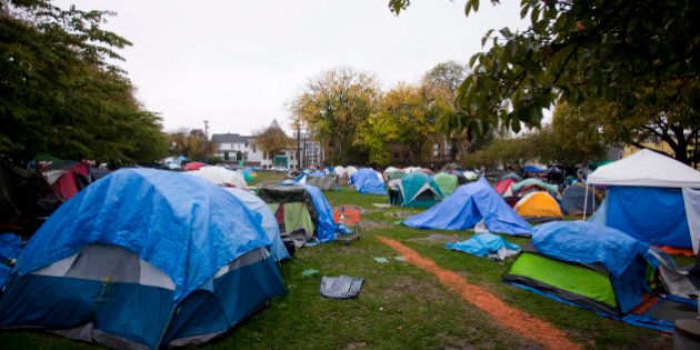 A general view of the tent city in Oppenheimer Park in Vancouver October 15, 2014. Dozens of homeless people who have occupied the park since July have been given a 10 p.m. PT deadline to move out of the unofficial tent city, after the B.C. Supreme Court granted an injunction and removal order last week, according to local media. REUTERS/Ben Nelms (CANADA - Tags: SOCIETY)