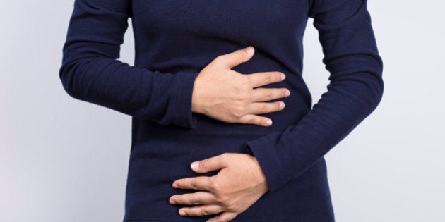 Health Care: Woman has stomach ache