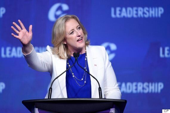 Lisa Raitt waves to the crowd during the opening night of the federal Conservative leadership convention in Toronto on May 26, 2017.