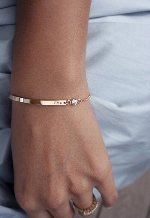 Nameplate bracelet.