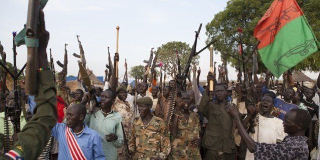 Members of the White Army, a South Sudanese anti-government militia, attend a rally in Nasir on April 14, 2014. Conflict in South Sudan has triggered a serious risk of famine that will kill up to 50,000 children within months if immediate action is not taken, the UN has warned. The African country has experienced high levels of malnutrition since it gained independence in 2011, UNICEF said, and conditions have worsened since ethnic conflict broke out between troops loyal to President Salva Kiir and supporters of his former deputy Riek Machar. AFP PHOTO / ZACHARIAS ABUBEKER (Photo credit should read ZACHARIAS ABUBEKER/AFP/Getty Images)