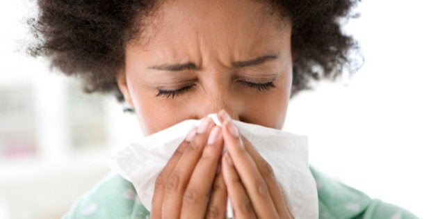 Woman Blowing Her Nose