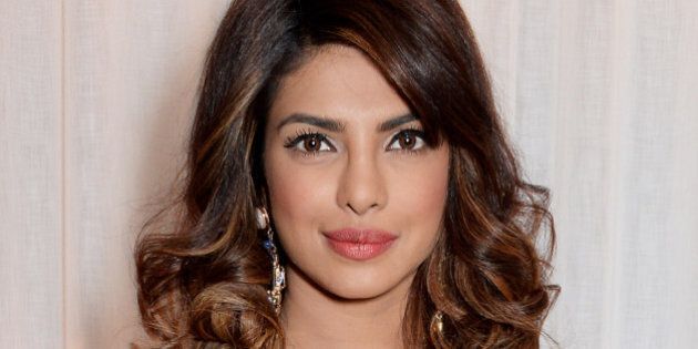 LONDON, ENGLAND - JANUARY 20: Priyanka Chopra attends the 'GUESS Loves Priyanka' VIP Dinner at the London Edition Hotel on January 20, 2014 in London, England. (Photo by David M. Benett/Getty Images for GUESS)