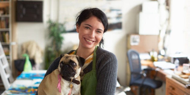 Portrait of a young artist in her studio