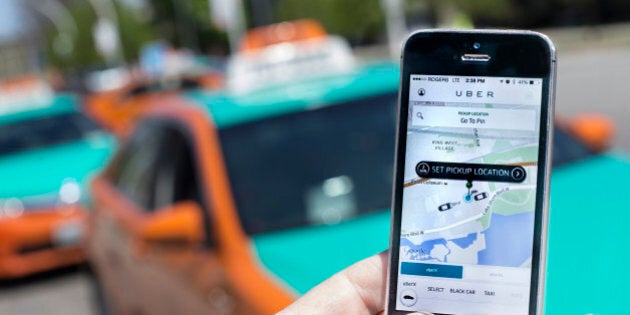 TORONTO, ON - MAY 14 -Photographed at The CNE, Toronto, Uber taxi service is a new way to travel around the city. Request and payment are all made using an app. (Bernard Weil/Toronto Star via Getty Images)