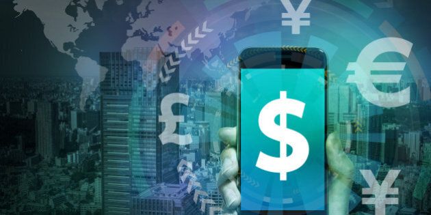 smart phone and financial technology (FinTech), US dollar and key currency symbols, worldwide trading, abstract image visual