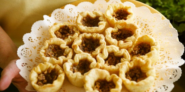 Person Holding Tray of Butter Tarts