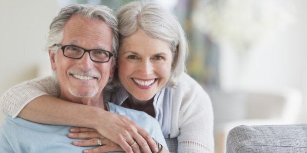 USA, New Jersey, Jersey City, Senior woman embracing senior man