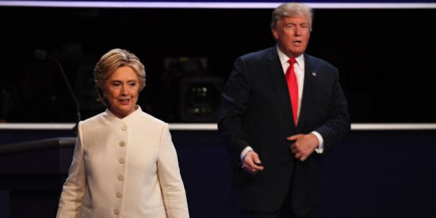 LAS VEGAS, Oct. 20, 2016 -- Republican presidential candidate Donald Trump and Democratic presidential candidate Hillary Clinton participate in the third and final presidential debate at the University of Nevada Las Vegas in Las Vegas, Nevada, the United States, Oct. 19, 2016.(Xinhua/Yin Bogu via Getty Images)