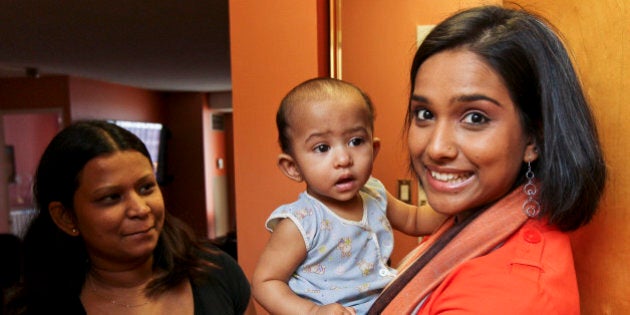 Mar 31 2011- Rathika Sitsabaiesan is the NDP candidate in Scarborough-Rouge River. In 2008 it had the lowest voter turn-out in the GTA in the last federal election. Stisabaiesan talks at the door with Sandy Rumana, 30, a young mom from Malaysia who just moved into the area. Her 9-month-old son's name is Ryan. (Photo by David Cooper/Toronto Star via Getty Images)