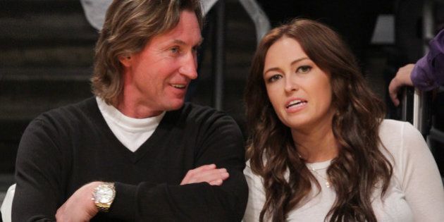 LOS ANGELES, CA - JANUARY 25: Wayne Gretzky (L) and his daughter Paulina Gretzky attend a game between the Utah Jazz and the Los Angeles Lakers at Staples Center on January 25, 2011 in Los Angeles, California. (Photo by Noel Vasquez/Getty Images)