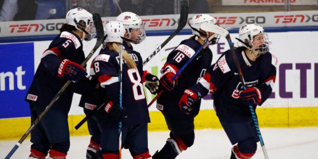 PLYMOUTH, MI - APRIL 06: Haley Skarupa #11 of the United States celebrates her third-period goal with teammates while playing Germany in a semifinal game at the 2017 IIHF Woman's World Championships at USA Hockey Arena on April 6, 2017 in Plymouth, Michigan. The United States won the game 11-0. (Photo by Gregory Shamus/Getty Images)
