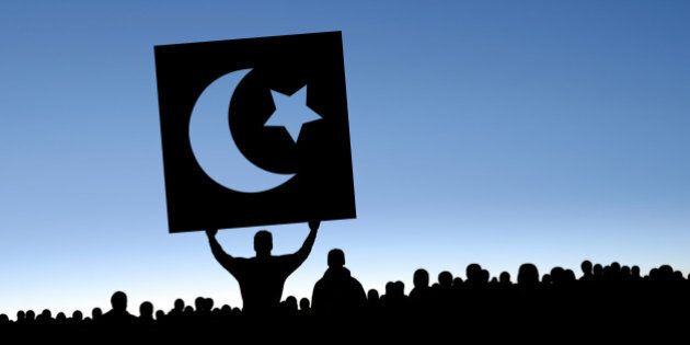 arab spring protestors in silhouette with crescent moon and star sign, panoramic frame (XXXL)