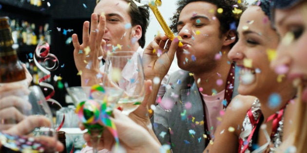 Friends at a party with confetti