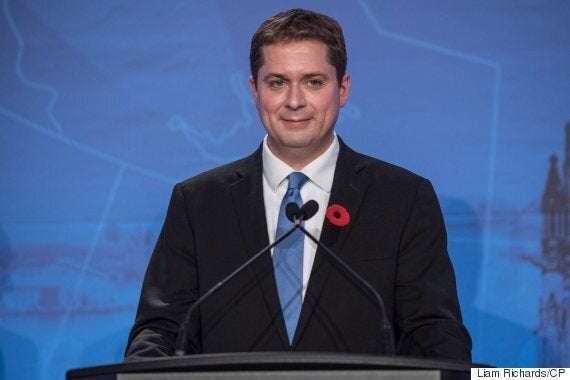 Conservative leadership candidate Andrew Scheer says if elected prime minister he will mandate the display of flags of countries that export oil to Canada at gas pumps.