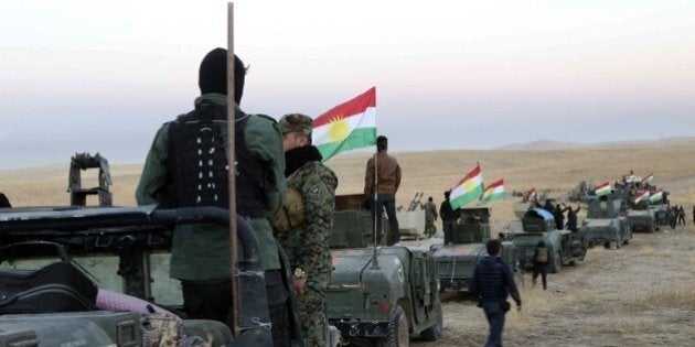 MOSUL, IRAQ - OCTOBER 17 : Peshmerga forces dispatch tanks and armored vehicles to Rabia and Karbali villages of Mosul as they attack on Deash targets during an operation to liberate Mosul from Daesh terrorist organization on October 17, 2016. A much anticipated Mosul offensive to liberate the city from Daesh began midnight Sunday, according to Iraqi Prime Minister Haider al-Abadi. (Photo by Idris Okuducu/Anadolu Agency/Getty Images)