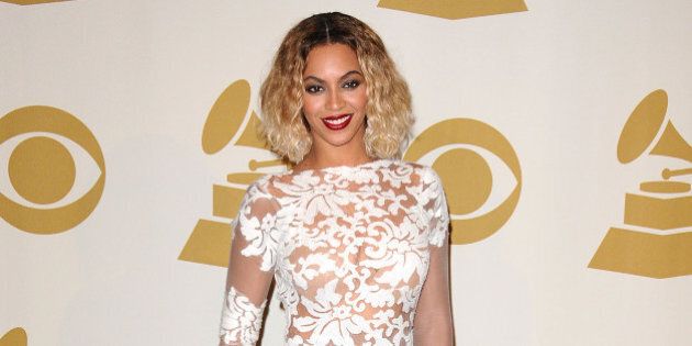 LOS ANGELES, CA - JANUARY 26: Beyonce poses in the press room at the 56th GRAMMY Awards at Staples Center on January 26, 2014 in Los Angeles, California. (Photo by Jason LaVeris/FilmMagic)