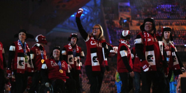 SOCHI, RUSSIA - MARCH 16: Canada team members enter the stadium prior to the Sochi 2014 Paralympic Winter Games Closing Ceremony at Fisht Olympic Stadium on March 16, 2014 in Sochi, Russia. (Photo by Hannah Peters/Getty Images)