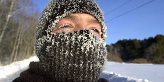 ** ADVANCE FOR MONDAY, MARCH 17 -- FILE ** Frost coats Ryan Douglas's eyelids and face mask as he jogs in subzero weather, Thursday, Feb. 13, 2003, in Freeport, Maine. This has been the coldest winter in Maine since 1993-94, but only the 12th coldest in the 63 years that the National Weather Service has kept records. (AP Photo/Robert F. Bukaty, files)