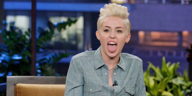 THE TONIGHT SHOW WITH JAY LENO -- Episode 4605 -- Pictured: Miley Cyrus during an interview on January 30, 2014 -- (Photo by: Paul Drinkwater/NBC/NBCU Photo Bank via Getty Images)