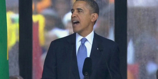 In this image from TV, US President Barack Obama speaks to the assembled crowds at the FNB Stadium in...