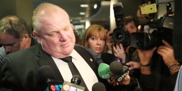 TORONTO, ON - MARCH 4: Mayor Rob Ford tries to put a positive spin on his performance the day after his appearance on the Jimmy Kimmel Show as he arrives at City Hall In Toronto. March 4, 2014. (Steve Russell/Toronto Star via Getty Images)