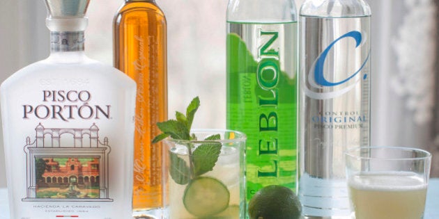 This April 28, 2014 photo shows, from left, Pisco Portion, Leblon special reserve, a cachaca mojito made with Leblon cachaca, Leblon cachaca, Control original pisco premium and a pisco sour in Concord, N.H. (AP Photo/Matthew Mead)