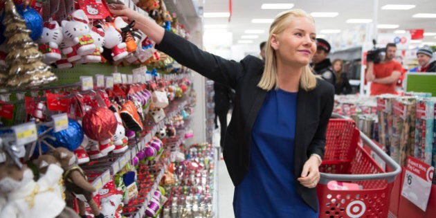 Elisha Cuthbert tours the Shoppers World Danforth Target store location for a surprise shopping event to celebrate the holiday season on Tuesday, Dec. 10, 2013, in Toronto, Canada. (Photo by Arthur Mola/Invision/AP)