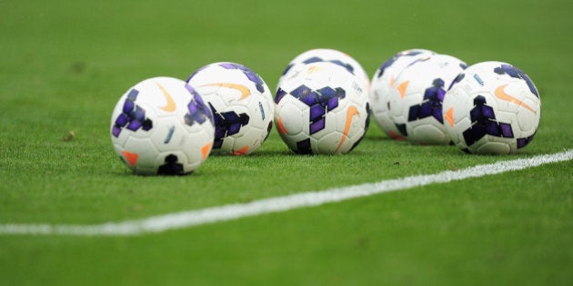 LONDON, ENGLAND - AUGUST 24: Match balls on the pitch ahead of the Barclays Premier League match between Fulham and Arsenal at Craven Cottage on August 24, 2013 in London, England. (Photo by Jamie McDonald/Getty Images)