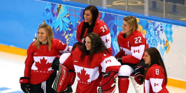 SOCHI, RUSSIA - FEBRUARY 06: Meghan Agosta-Marciano #2, Natalie Spooner #24, Shannon Szabados #1, Hayley Wickenheiser #22 and Laura Fortino #8 of Canada pose for photo on the ice prior to their Women's Ice Hockey practice session ahead of the Sochi 2014 Winter Olympics at the Shayba Arena on February 6, 2014 in Sochi, Russia. (Photo by Martin Rose/Getty Images)