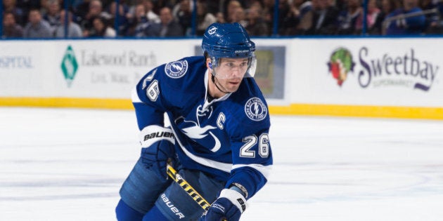 TAMPA, FL - JANUARY 23: Martin St. Louis #26 of the Tampa Bay Lightning skates against the Ottawa Senators at the Tampa Bay Times Forum on January 23, 2014 in Tampa, Florida. (Photo by Scott Audette/NHLI via Getty Images)