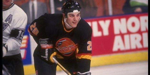 1990-1991: Leftwinger Gino Odjick of the Vancouver Canucks. Mandatory Credit: Ken Levine /Allsport