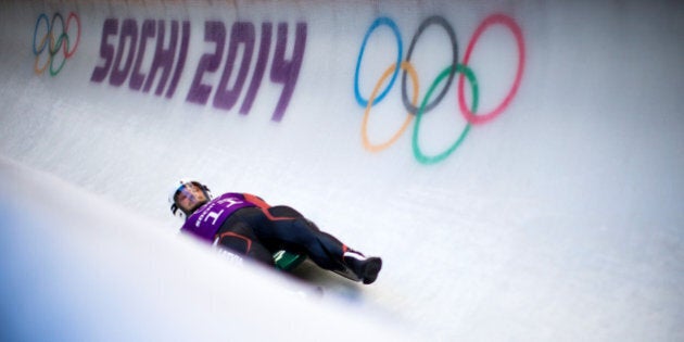 SOCHI, RUSSIA - FEBRUARY 06: Inars Kivlenieks of Latvia takes part at the Luge Men's Singles Training session ahead of the Sochi 2014 Winter Olympics at the Sanki Sliding Center on February 6, 2014 in Sochi, Russia. (Photo by Vladimir Rys Photography/Getty Images)