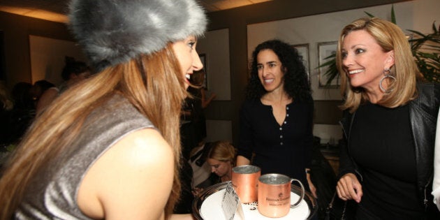 WEST HOLLYWOOD, CA - NOVEMBER 19: Julia Parker (R) and guest attend LA Confidential and Burke Williams honor Amanda Hunt at The Incredible Individuals Event presented by Russian Standard Vodka on November 19, 2013 in West Hollywood, California. (Photo by Chelsea Lauren/WireImage)